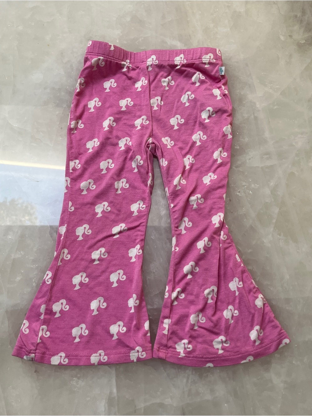 Posh Peanut Barbie Pink Flare Leggings with White Barbie Silhouettes